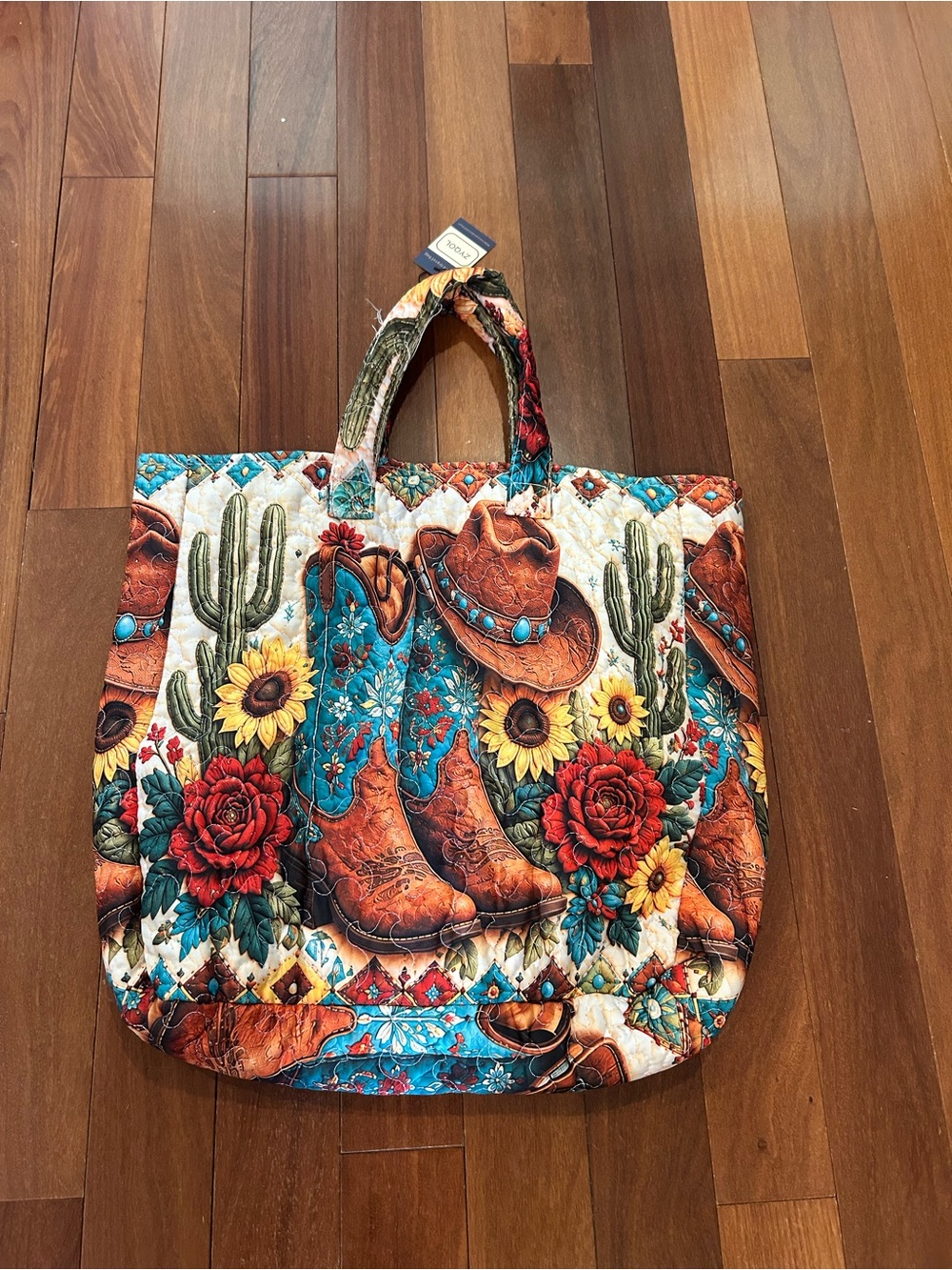Zyqol Quilted Travel Bag with cowboy boots, cacti, and sunflowers design